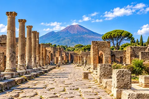 Le colonne di Pompei col Vesuvio sullo sfondo